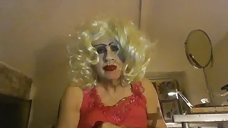 Sissy CumDump, CD Sarah Millward, smokes and tries to look sexy, like an MILF prostitute
